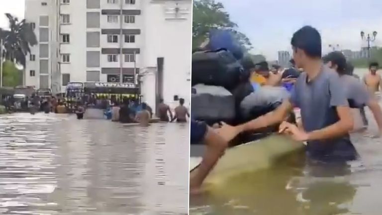 Chennai Rains: వీడియో ఇదిగో, నడుం లోతు నీళ్లలో చొక్కాలు విప్పి విద్యార్థులు అవస్థలు, చెన్నై నగరాన్ని అస్తవ్యస్తం చేసిన వరదలు