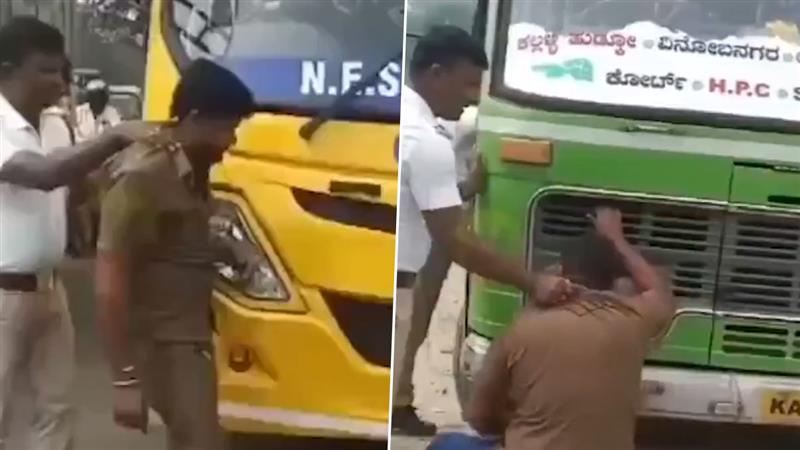 Bengaluru Police: వీడియో ఇదిగో, హారన్ కొట్టిన డ్రైవర్‌కు దిమ్మతిరిగే పనిష్మెంట్‌ ఇచ్చిన పోలీసులు, తను నడిపై బస్సు ముందే కూర్చొపెట్టి హారన్ కొట్టడంతో బిత్తరపోయిన డ్రైవర్