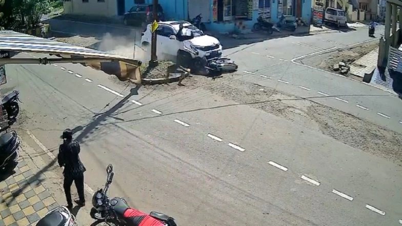 Accident Caught on Camera: వీడియో ఇదిగో, వేగంగా వచ్చి బైకును ఢీకొట్టిన కారు, ఎగిరి అవతల పడిన వాహనదారుడు, దాదాపు 100 మీటర్ల దూరం ఈడ్చుకెళ్లిన కారు