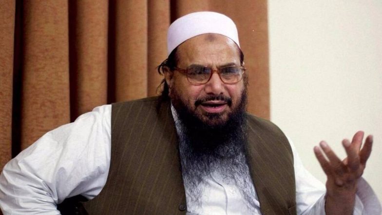 Hafiz Saeed Convicted: ముంబై పేలుళ్ల సూత్రధారి హఫీజ్ సయీద్కు ఐదున్నరేళ్ల జైలు శిక్ష విధింపు, ఉగ్రవాదులకు నిధులు సమకూరుస్తున్నాడన్న అభియోగంలో దోషిగా తేల్చిన పాకిస్థాన్ కోర్టు Hafiz Saeed Convicted: ముంబై పేలుళ్ల సూత్రధారి హఫీజ్ సయీద్కు ఐదున్నరేళ్ల జైలు శిక్ష విధింపు, ఉగ్రవాదులకు నిధులు సమకూరుస్తున్నాడన్న అభియోగంలో దోషిగా తేల్చిన పాకిస్థాన్ కోర్టు
