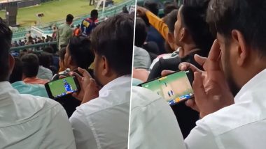 Spectator Watches IPL 2023: స్టేడియంలో ఎదురుగా మ్యాచ్ జరుగుతుండగానే అతను చేసిన పనికి షాకైన ఫ్యాన్స్, ట్విట్టర్‌లో వైరల్‌ వీడియోపై ఫన్నీ కామెంట్లు