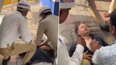 Police Saves Man Life Video: వీడియో ఇదిగో, స్కూటర్ మీద వెళుతుండగా అకస్మాత్తుగా గుండెపోటు, సీపీఆర్ అందించి ప్రాణాలు కాపాడిన గుజరాత్ పోలీసులు