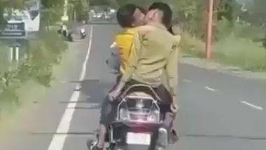 Guys Kissing Video: ఇదేం పాడు బుద్ధి, బైక్ మీద వెళుతూ ముద్దులతో రెచ్చిపోయిన ఇద్దరు అబ్బాయిలు, వీడియో వైరల్ కావడంతో రంగంలోకి దిగిన పోలీసులు