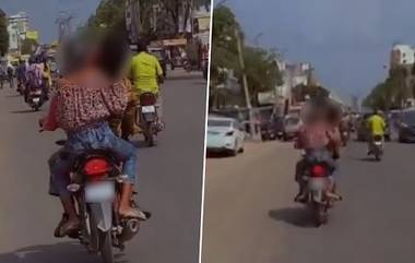 Couple Kissing on Bike Video: లవర్స్ మరో కిస్సింగ్ వీడియో వైరల్, బైక్ మీద వేగంగా వెళుతూ ముద్దులో మునిగి తేలిన ప్రేమ జంట