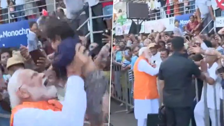 PM Modi Kisses Child: పసిపాపను ఎత్తుకుని ముద్దాడుతూ ఆడించిన ప్రధాని మోదీ, వీడియో సోషల్ మీడియాలో వైరల్, ప్రతి ఒక్కరూ ఓటు వేసి ప్రజాస్వామ్యాన్ని బలోపేతం చేయాలని పిలుపు