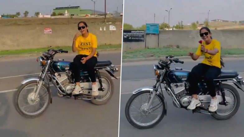 Woman's Dangerous Bike Stunt Video: పడితే ఇక అంతే సంగతులు, నడిరోడ్డు మీద యువతి డేంజరస్ స్టంట్ వీడియో మీరే చూడండి, ఇదేం పిచ్చి అంటూ మండిపడుతున్న నెటిజన్లు
